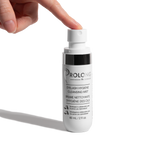 A hand presses the pump of a white bottle labeled Prolong Dr. Janice Luk Eyelash Hygiene Cleansing Mist against a clean white background.